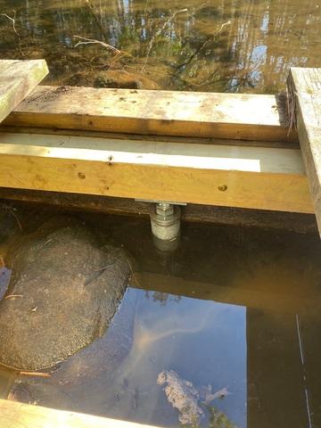 Helical Piers Anchored to Wooden Supports