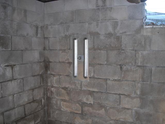 Wall anchor to reinforce bowing wall