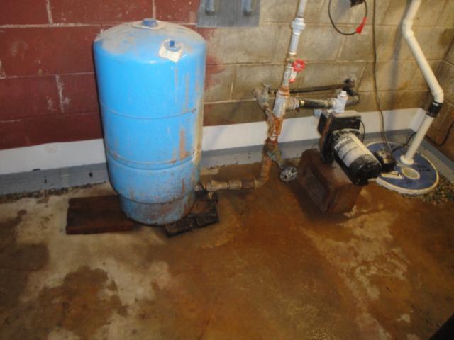 WaterGuard is designed to drain cinderblocks of water and to push water into a sump pump.  Here we have installed an UltraSump pump to discharge the water from the perimeter drain.