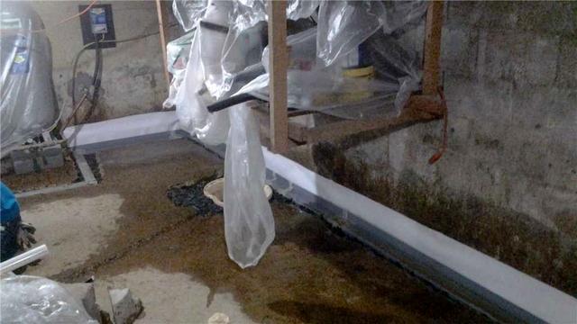 <p>The installation of our WaterGuard basement waterproofing drainage system will keep this basement dry.</p>