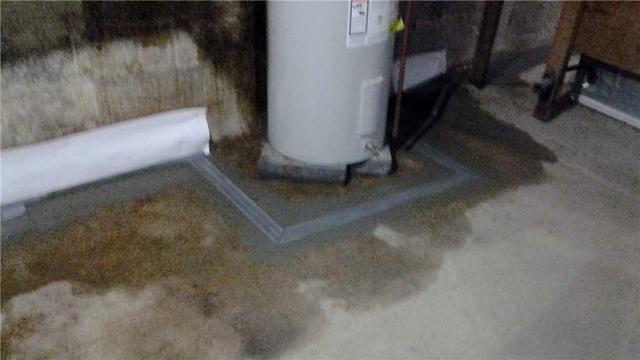 <p>The basement is waterproofed with WaterGuard and TrenchDrains.</p>