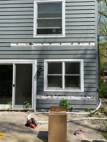 Siding Carefully Removed, Holes Drilled