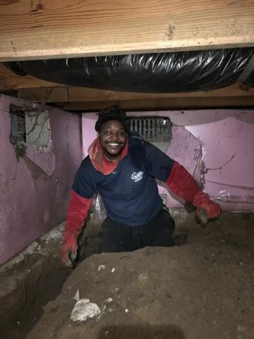 You know you're doing something right when your team is smiling in a crawl space!