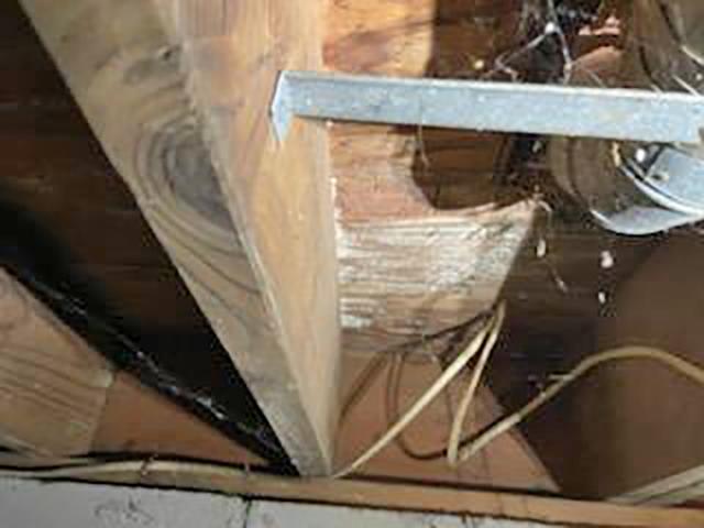 We then used our mold stain remover, scrubbed away all the excess mold staining throughout the rafters, and applied MAPS 2.