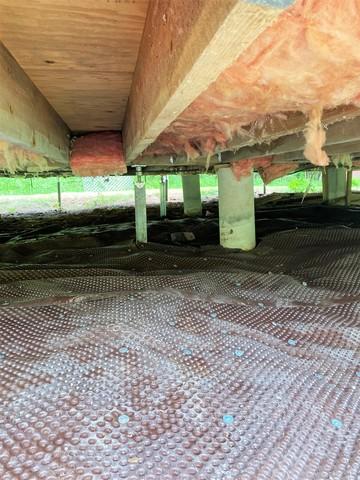 Drainage Matting Beneath the Cabin
