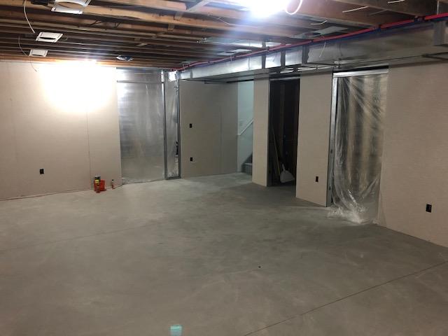 The EverLast Wall Panels have been installed, with areas cut for the new electrical outlets and switches to be installed. The ceiling will soon be painted, and a Thermal Dry Elite Plank Floor will be installed!