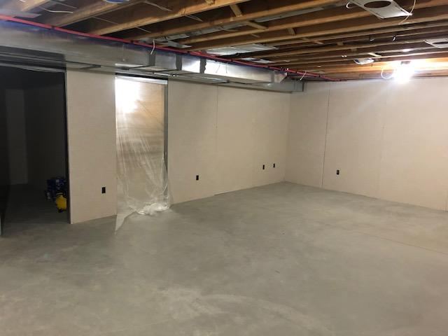 The EverLast Wall Panels have been installed, with areas cut for the new electrical outlets and switches to be installed. The ceiling will soon be painted, and a Thermal Dry Elite Plank Floor will be installed!