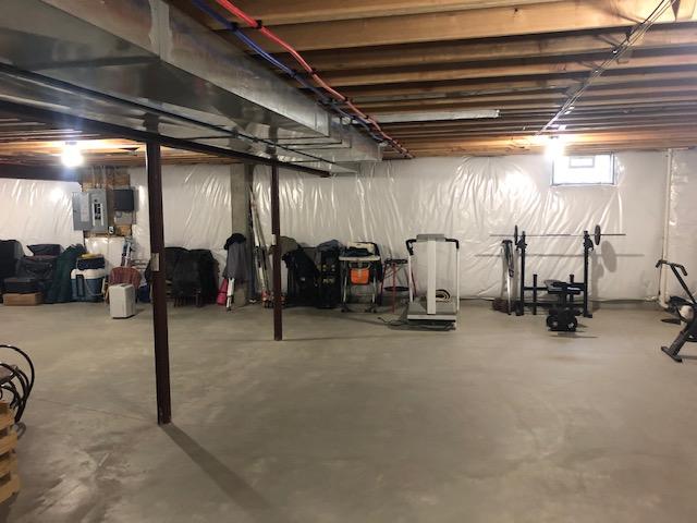 The basement before we started work was insulated but was otherwise a blank slate ready to be made into something new and wonderful for the family.