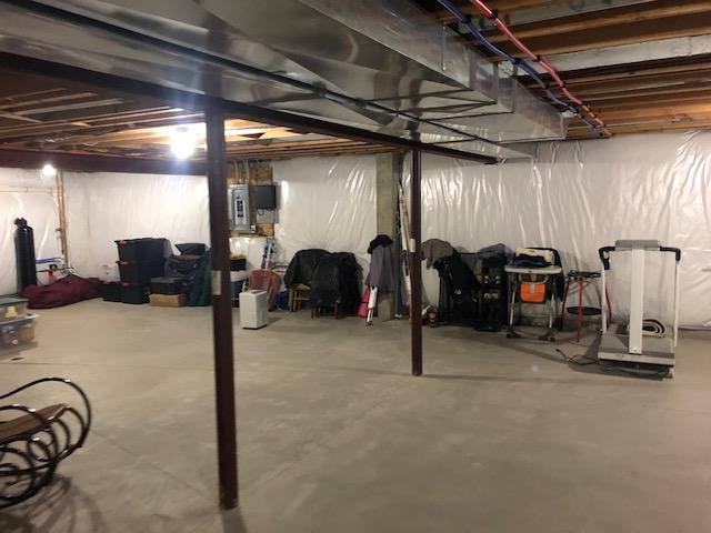 The basement before we started work was insulated but was otherwise a blank slate ready to be made into something new and wonderful for the family.