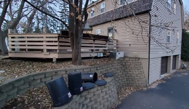 Exterior Look at Garage and Basement Space