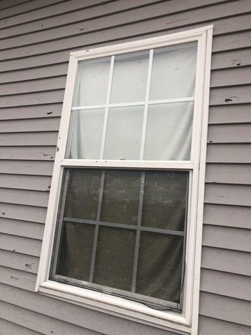 Extensive Hail Damage to Exterior