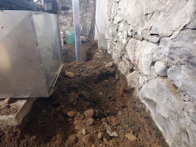 Once the remainder of the basement was dug out we finished by digging the floor behind the mechanicals down to the proper height