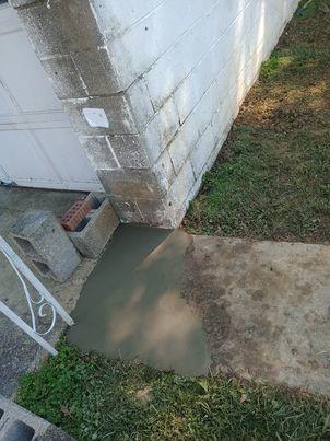 David C. in Salt Rock had cracks in the walls of his garage and noticed that the floor was starting to sink.