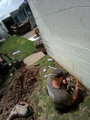 Our BSWV crews installed nin hydraulically-driven Push Piers under the garage in order to stabilize the settling area.