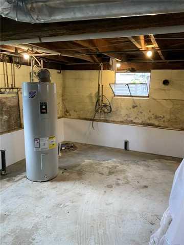 Walls had been painted but were flakey and coming apart, homeowners wanted to reclaim this space!