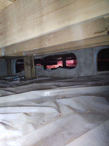 This was the crawl space before we got started insulating and encapsulating it. As you can see it is dirty and not much of a usable space even though there is a plastic cover put down over the dirt floor.