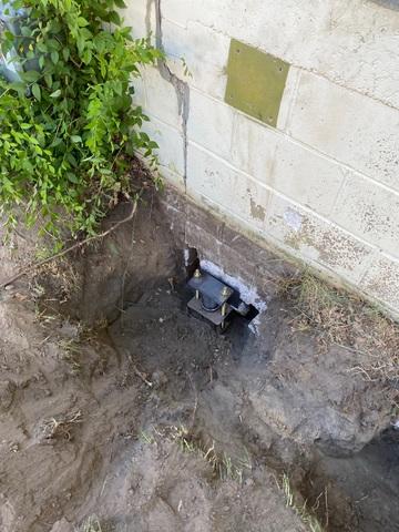 Push Pier Bracket Installed on Home's Footing