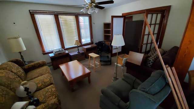 A room full of furniture that needed to be emptied