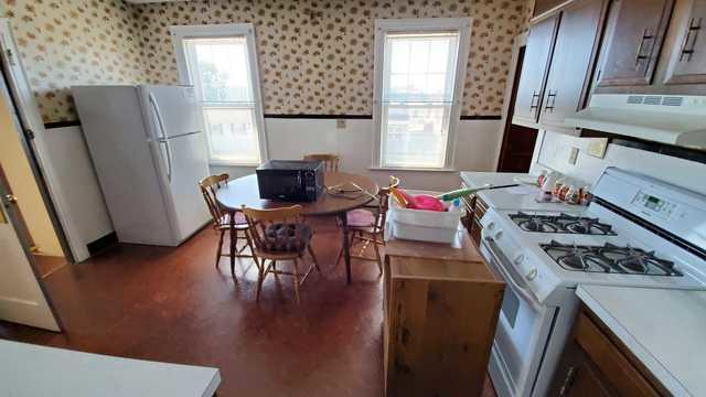 The kitchen which needed a view pieces of the furniture taken by our team