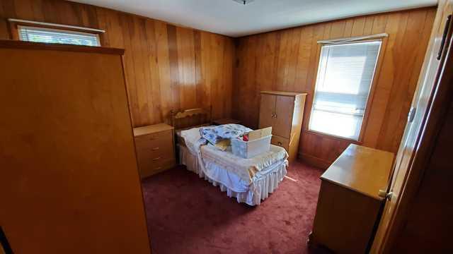 One bedroom which needed all furniture removed