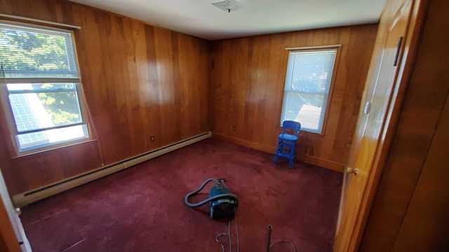 One of the bedrooms emptied and cleaned