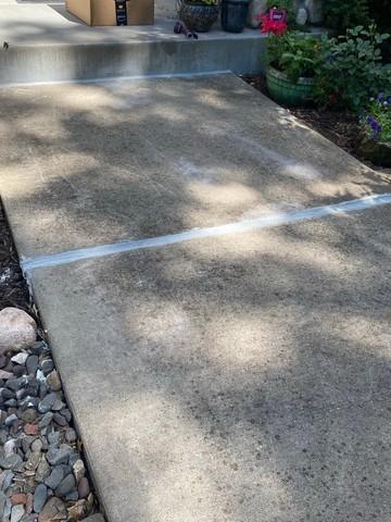 NexusPro™ Joint Sealant on Lifted Sidewalk