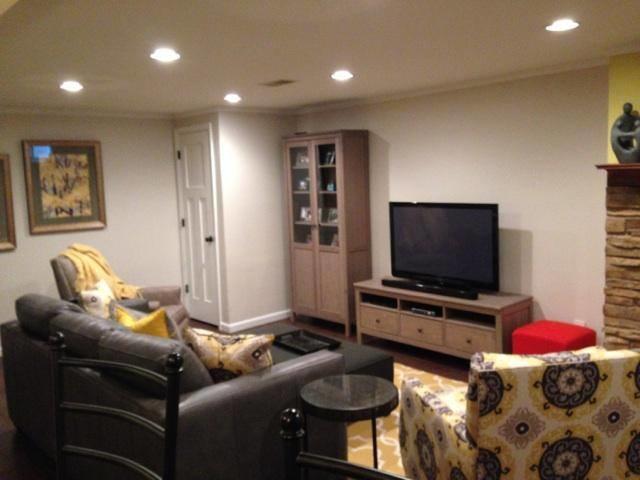 We just adore the finishing touches added to this basement! This family put chic furniture and decorations in their space, making it perfect for entertaining. When you're sitting here, you forget that you're even in a basement!