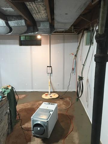 Our team completed the project by installing our Aprilaire Dehumidifier, filling the open gaps with rock, and applying a new later of concrete to ensure the space looked neat and clean.