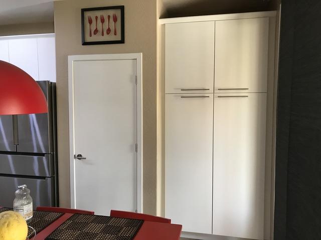 Before, this section was a desk area that had no use for them. Taller cabinetry allowed for more storage space to better utilize their layout.