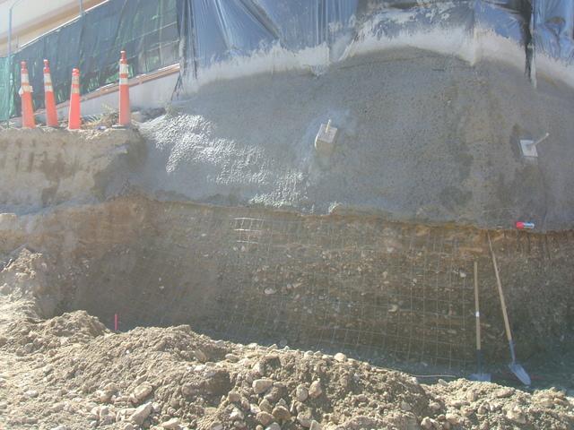 <p>In this picture you can see the first layer of shotcrete and the helical tiebacks</p>