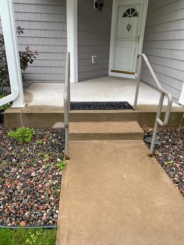 Our crew successfully lifted and leveled this concrete walkway in Bayfield, WI. After drilling pea-sized holes into the concrete, PolyLevel was injected to fill any voids beneath the concrete.