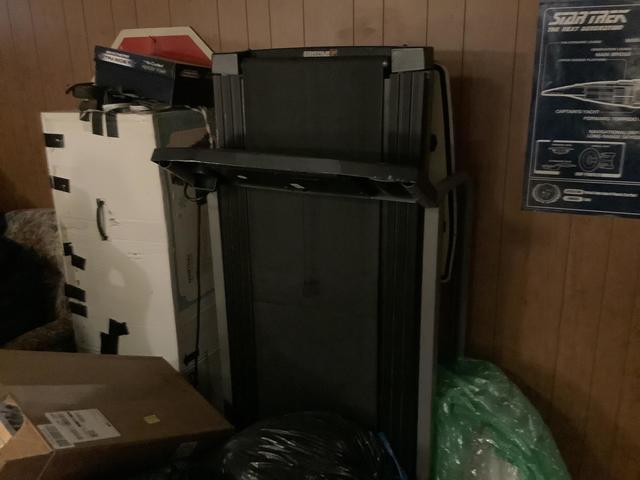 <p>Removing treadmill from the basement</p>