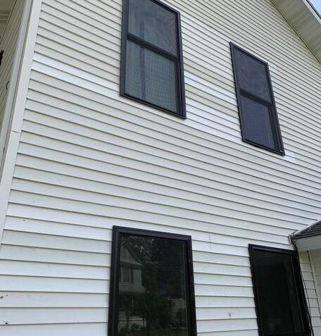 <p>New vinyl windows with the black trim</p>