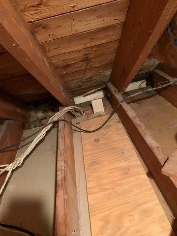 Clean attic ready for new insulation.