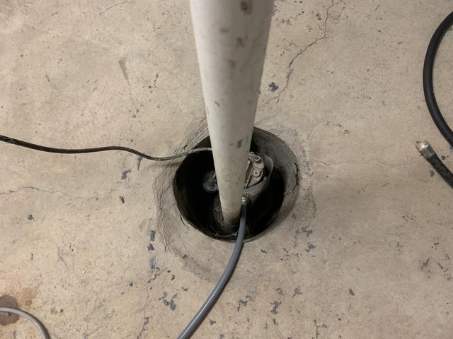 Old sump pump that could not keep up with moisture demands. Also, open sump pumps allow water vapor to escape into the air, causing more moisture issues.