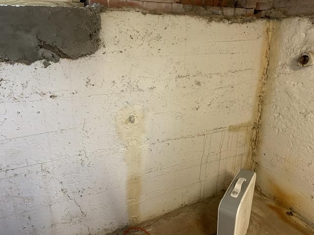 Evidence of moisture issues long the walls