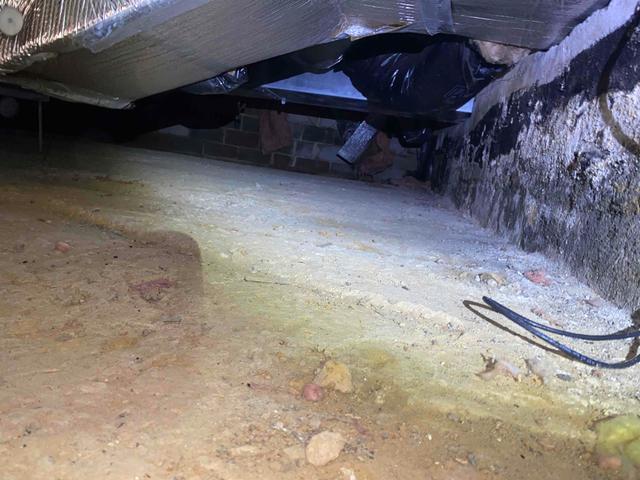 Damp and Dirty Crawl Space