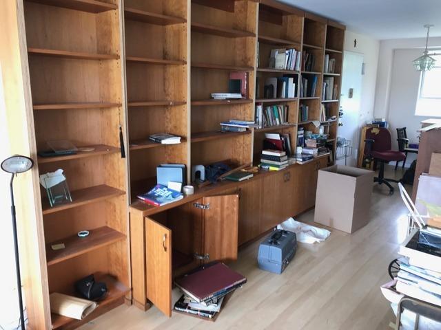 Office ready for decluttering in an apartment in Kingsbridge, Bronx, NY.