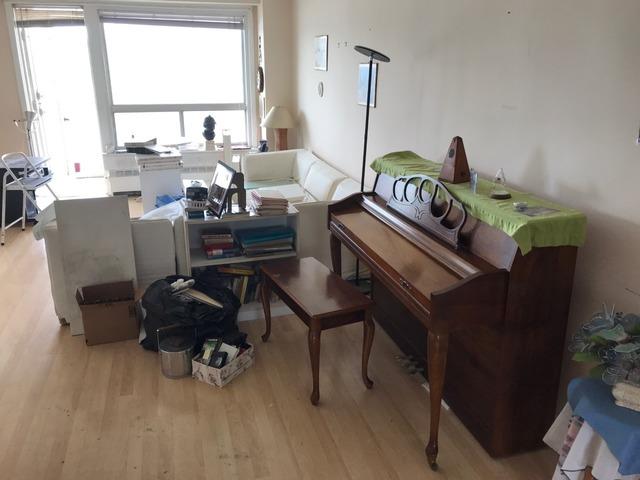Piano ready for decluttering in an apartment in Kingsbridge, Bronx, NY.