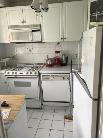 Kitchen ready for decluttering in an apartment in Kingsbridge, Bronx, NY.
