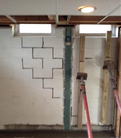 Staircase Type Wall Cracks Show Foundation Issue in Ann Arbor, Mi