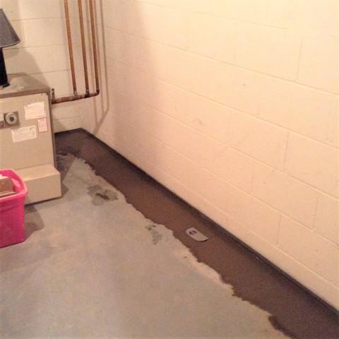 On the interior, the basement waterproofed by installing a perimeter drainage system connected to a brand new TripleSafe Sump Pump!