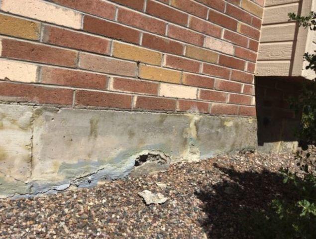 Symptoms of Stem Wall Failure: Spalling Concrete