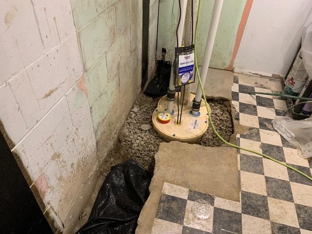 This is the DoubleSafe Sump Pump System and you can see the WaterGuard goes right to it so that the water can be expelled out of the home keeping the area dry!