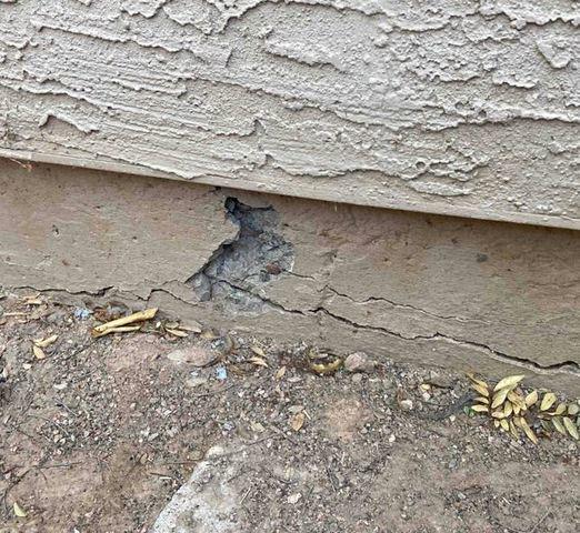 Signs of Advanced Rust in Stem Wall: Vertical Concrete Cracks