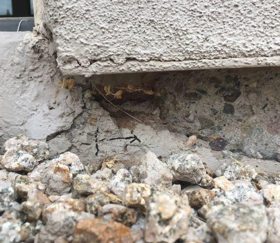 Stem Wall Failure Symptoms: Spalling Concrete