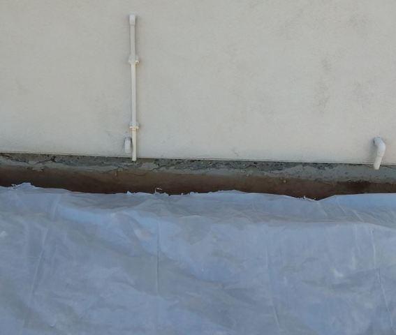 Mid Process of Stem Wall Repair: Protecting Surroundings