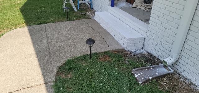 Uneven concrete sidewalk