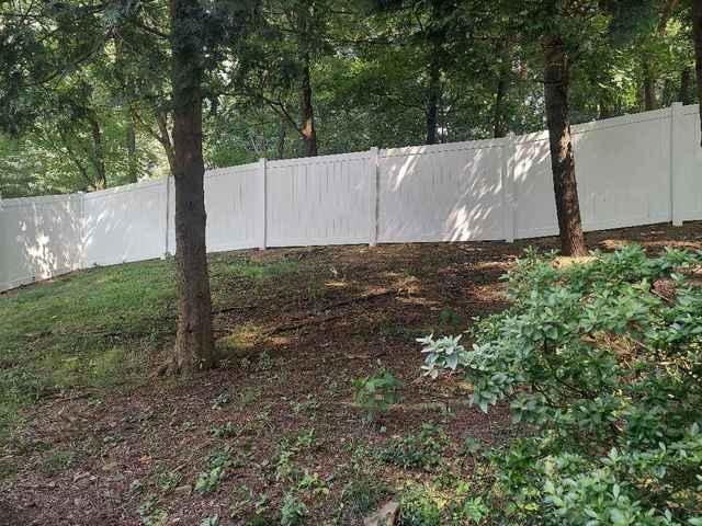 5' Khaki Vinyl Acadia Privacy Fence on backyard