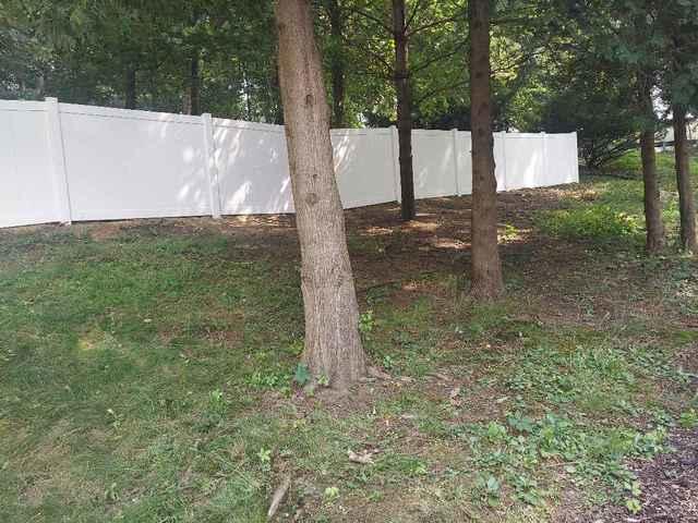 5' Khaki Vinyl Acadia Privacy Fence on backyard